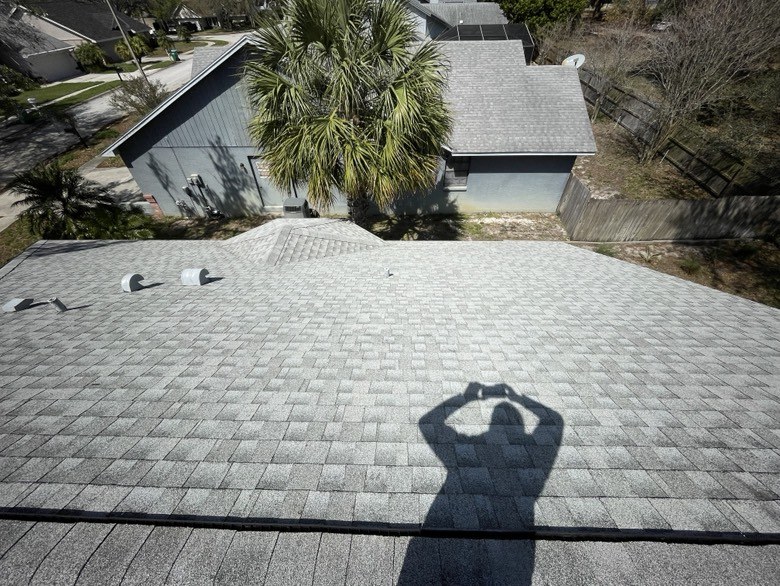Finished shingle roof after a soft wash
